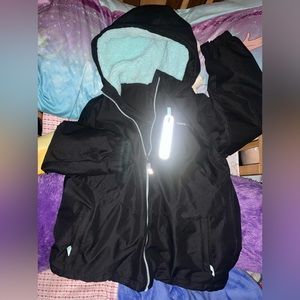 Never worn Large black Swisstech double zipper coat.